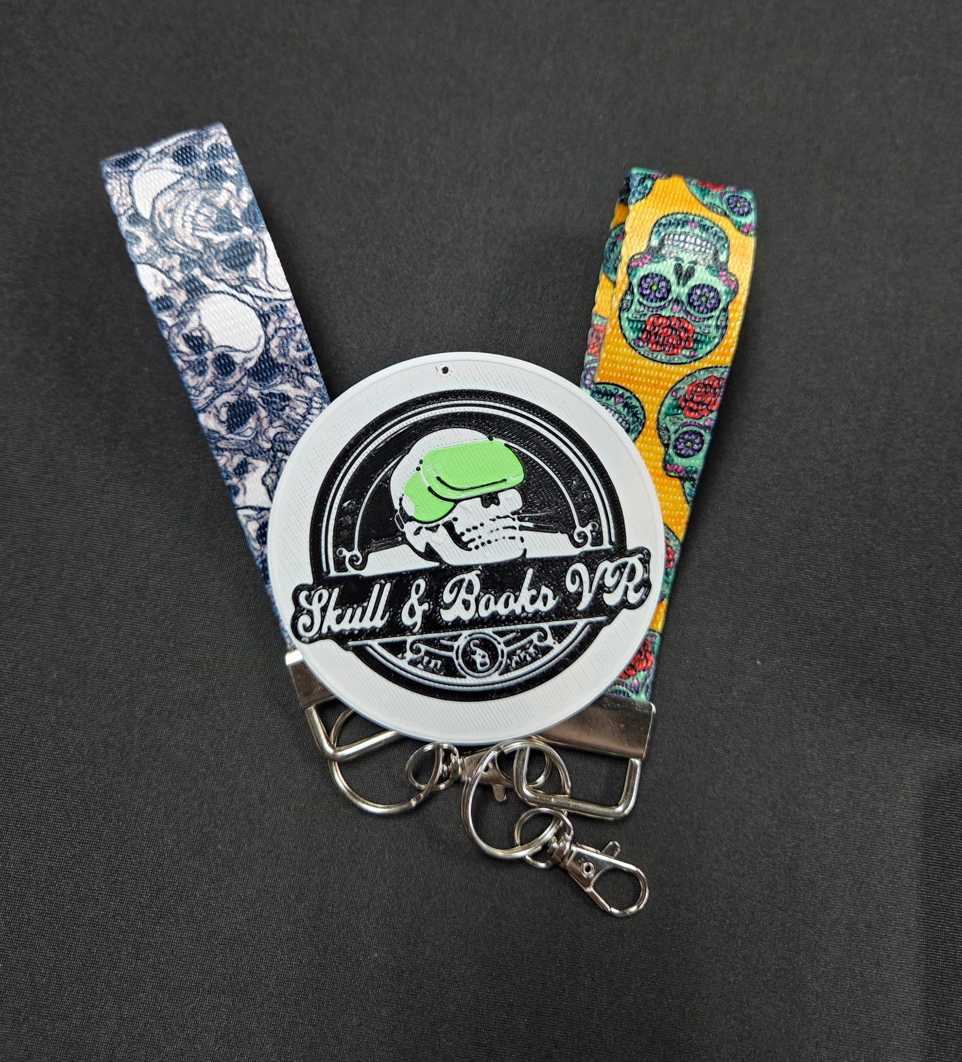 wristlet keychain and Skull & Books VR Logo