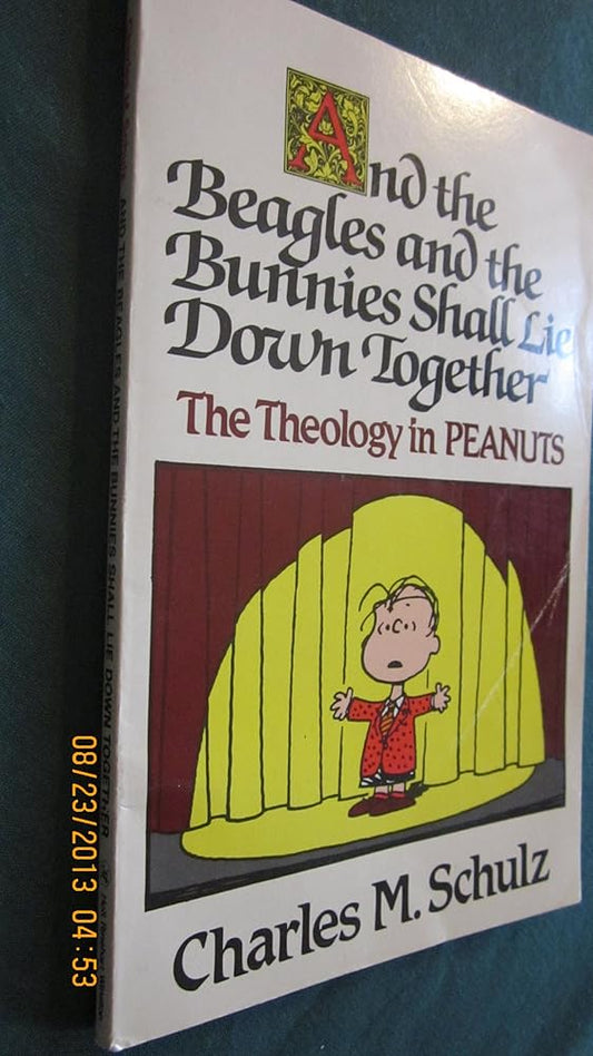 And the Beagles and the Bunnies Shall Lie Down Together: The Theology in Peanuts Used Book at Skull & Books VR Cocoa Beach