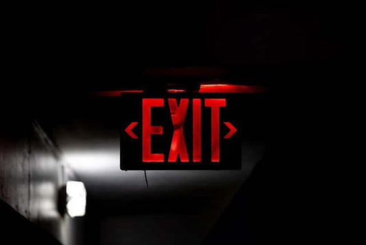 Exit Sign representing Escape Rooms at Skull & Books VR in Cocoa Beach