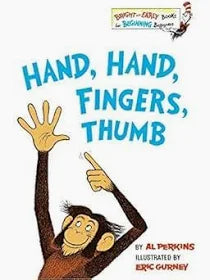 Hand, Hand, Fingers, Thumb with Plush Monkey Used Book at Skull & Books VR Cocoa Beach